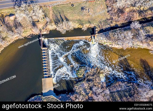 water diversion dam on the South Platte River abover Brigthon, Colorado - aerial in early spring scenery