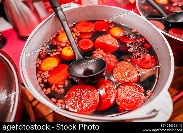 Freshly cooked mulled wine in the pan, close view
