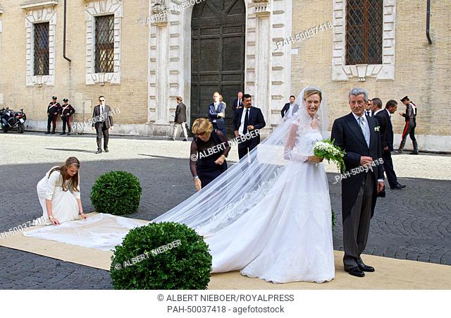 The bride, Italian journalist Elisabetta Maria Rosboch von Wolkenstein, arrives arrives with her father Ettore Rosboch von Wolkenstein to marry Prince Amedeo of...