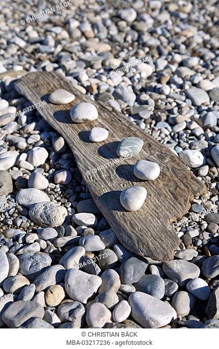 Plank and stones in the riverside of the Loisach near Großweil, Alpine foreland, Bavaria, Germany