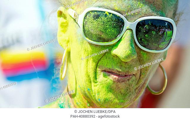 A participant in the Color Run is pictured after the race in Hanover, Germany, 07 July 2013. Several thousand participants took part in a 5 km run during which...