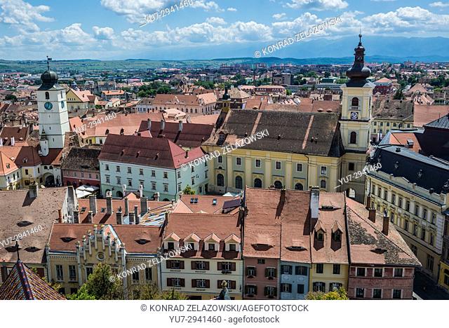 Aerial view with Holy Trinity Church and Council Tower from Lutheran Cathedral of Saint Mary in Historic Center of Sibiu, Transylvania, Romania