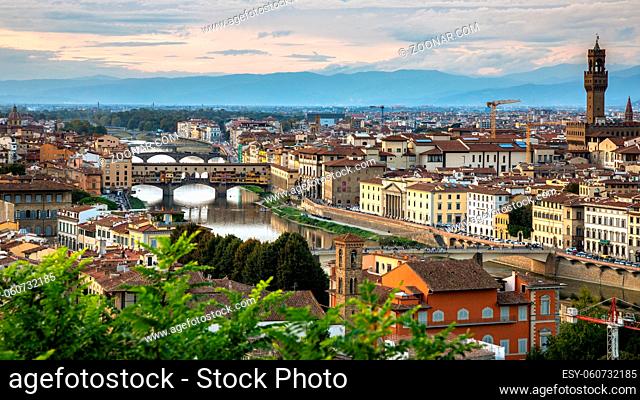 FLORENCE, TUSCANY/ITALY - OCTOBER 18 : View of buildings along and across the River Arno in Florence on October 18, 2019