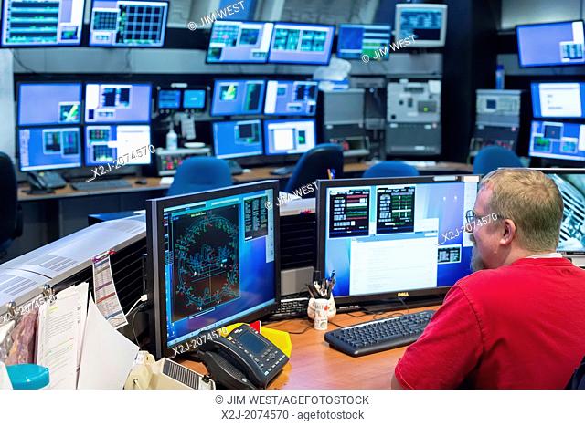 Batavia, Illinois - Operations crew chief in the accelerator control complex at the Fermi National Accelerator Laboratory