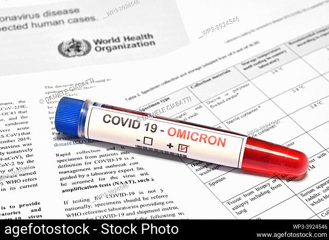 Florence: Blood tube for test detection of virus Covid-19 Omicron Variant with positive result on papers document