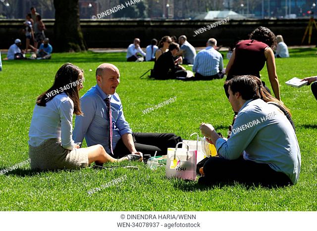 People enjoy the warm weather in London. Heatwave in London and South East as temperatures are likely to reach 28 degrees celsius and will be the hottest April...