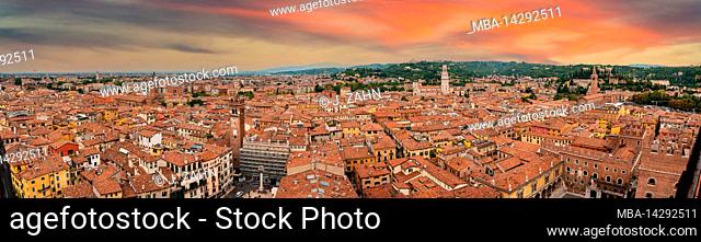 Famous panoramic view above the roofs of Verona, seen from Torre dei Lomberti, Italy