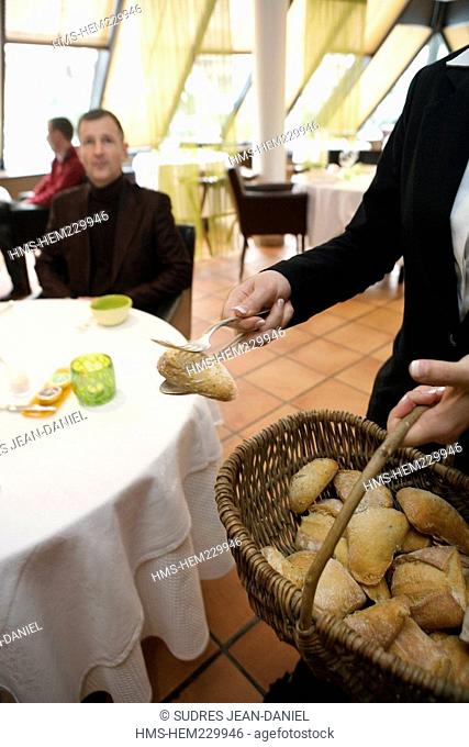 France, Savoie, Chambery, Jean Michel Bouvier owner of L'Essentiel Restaurant, serving of home made bread