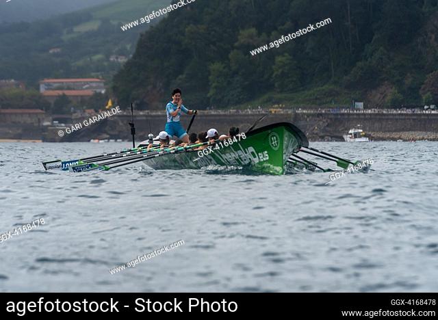 Crew of Hondarribia rowing boat in action during XV Zarauzko Ikurrina women’s regatta of the ACT Euskotren League (The Association of Clubs of rowing boats)