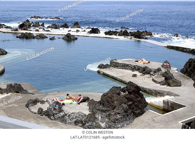Swimming pool beside the coast. Hotel. Resort. tourism