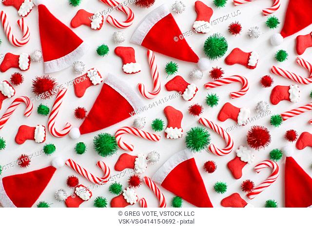 Christmas decoration of santa hats, candy canes and Christmas stockings