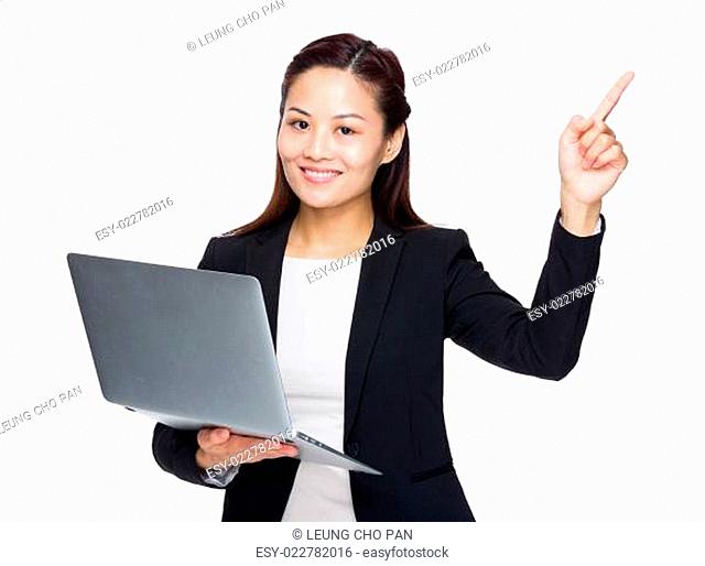 Business woman with laptop computer and finger point up