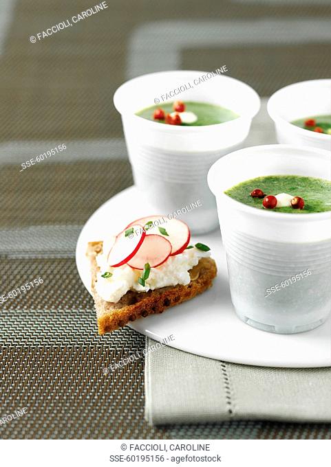 Cream of spinach soup with pink peppercorns