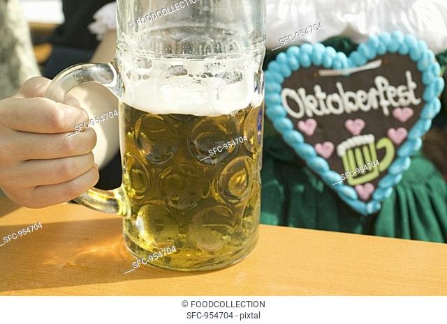 Woman with litre of beer at Oktoberfest