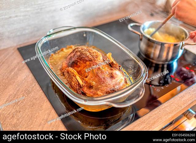 Homemade Roasting Duck in oven. Crispy whole roast duck