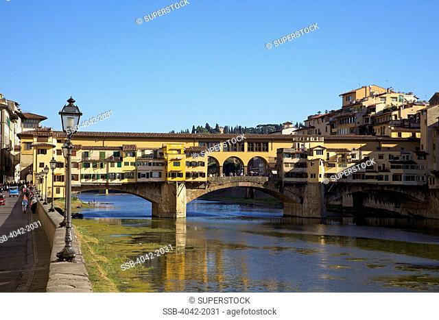 Bridge across a river, Ponte Vecchio, River Arno, Florence, Tuscany, Italy