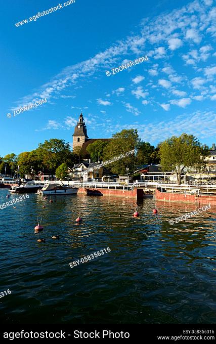 Portrait of harbor with beautiful scenery and Christian church in the background in Naantali Finland