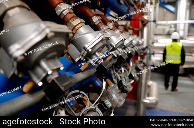 07 April 2022, Hall, Sachsen-Anhalt: Piping of a fluidized bed furnace in a sewage sludge incineration plant. The facility for the energetic processing of...