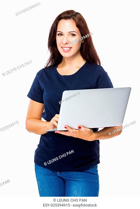 Brunette woman use of laptop