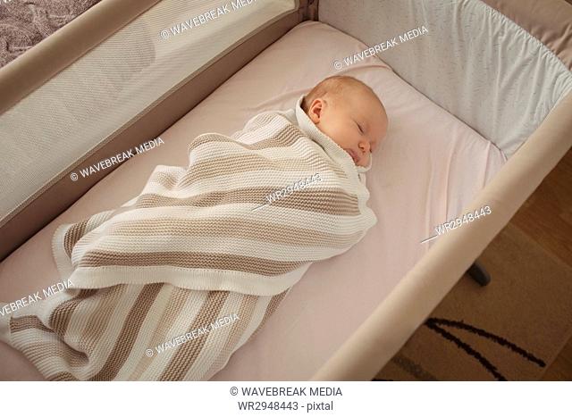 Baby sleeping in crib