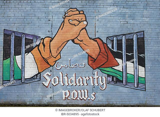 Mural, political graffiti on wall in West Belfast reminding of the civil war between Protestants and Catholics, Belfast, County Antrim, Northern Ireland