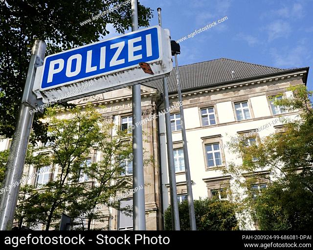 23 September 2020, North Rhine-Westphalia, Essen: A police sign stands in front of the Essen police headquarters. Around 30 police officers are suspected of...