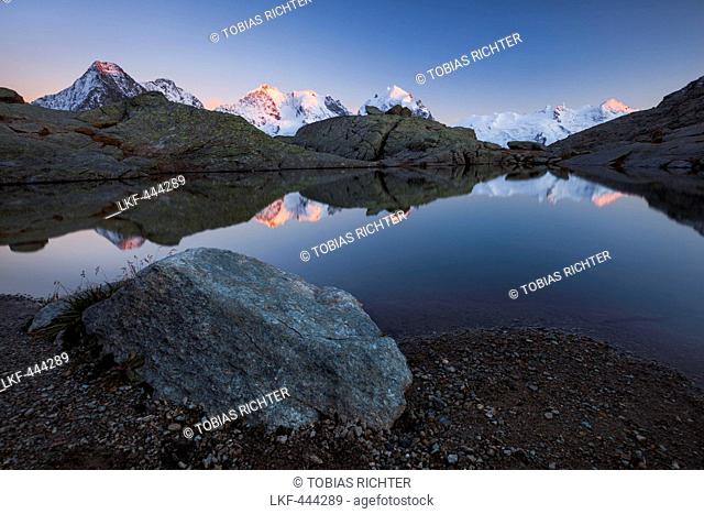 Alpenglow on the peaks of Bernina Range, Val Roseg, Engadin, Canton of Grisons, Switzerland