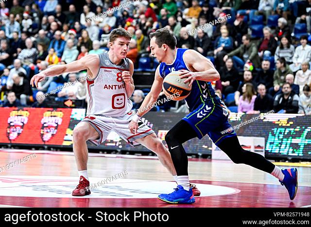 Antwerp's Jo Van Buggenhout and Mons' Conley Garrison pictured in action during a basketball match between Antwerp Giants and Mons Hainaut