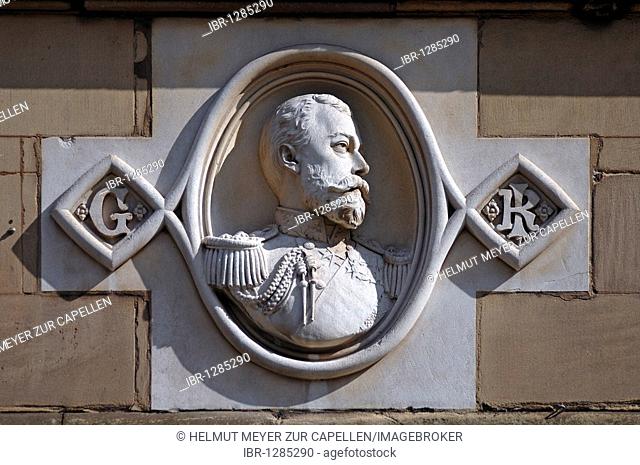 Relief of George V, 1865 - 1936, King of England, 1910-1936, on a building, Bore Street, Lichfield, Staffordshire, England, United Kingdom, Europe