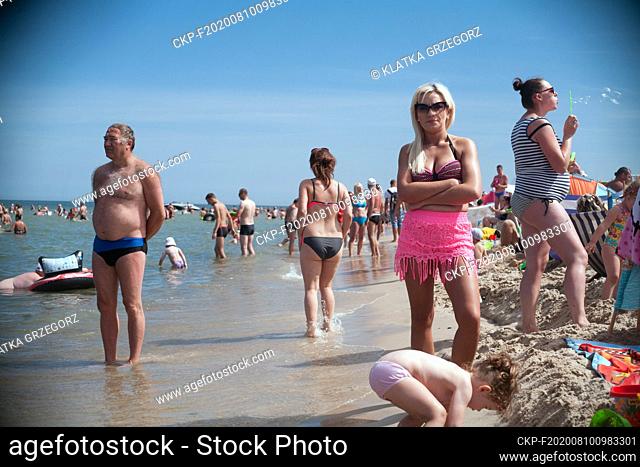 Poland, Wladyslawowo 05.08.2015. Tourists at the beach in the popular seaside resort. photo CTK / Grzegorz Klatka