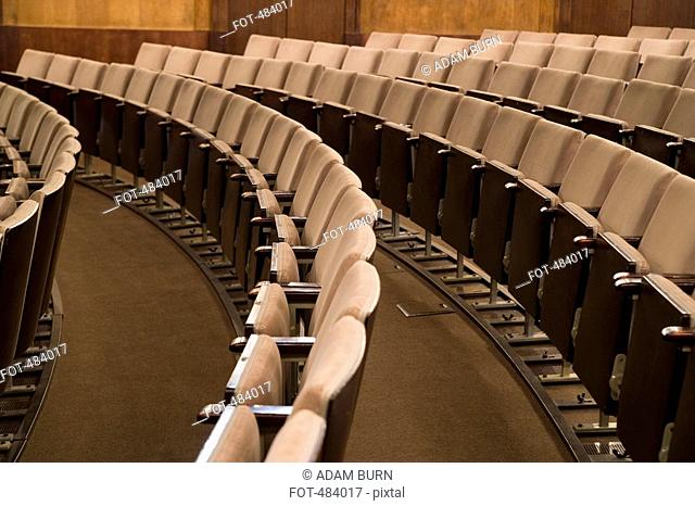 Rows of empty seating in an auditorium