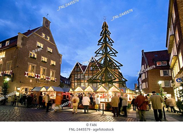 Group of people at Christmas market, Kiepenkerl, Stadtlohn, Muensterland, North Rhine-Westphalia, Germany