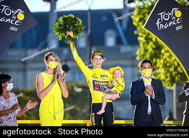 Danish Jonas Vingegaard of Jumbo-Visma celebrates on the podium in the yellow jersey of leader in the overall ranking after stage 21