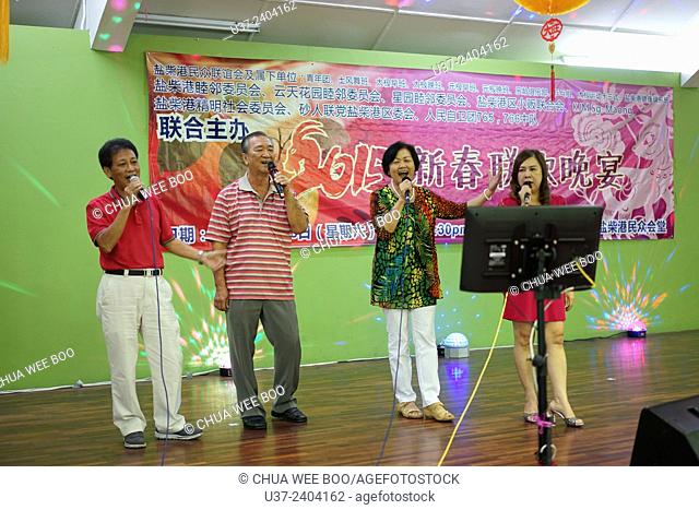Karaoke for Chinese New Year dinner at Sungai Maong Community Hall, Kuching, Sarawak, Malaysia
