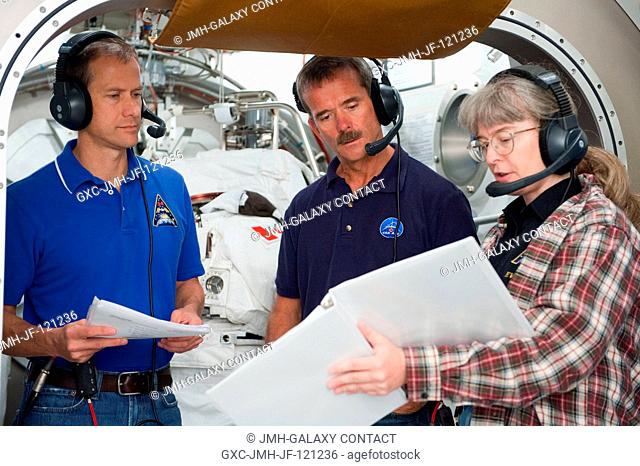 Canadian Space Agency astronaut Chris Hadfield, Expedition 34 flight engineer and Expedition 35 commander, participates in an Extravehicular Mobility Unit (EMU)...