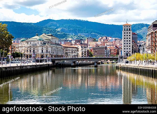 The cityscape of Bilbao, Spain. The Nervion river crosses Bilbao downtown, hosting in its margins the traditional and modern buildings of the city