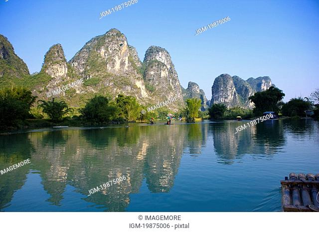 China, Guangxi Province, Guilin, Yangshuo, Yulong River with mountain