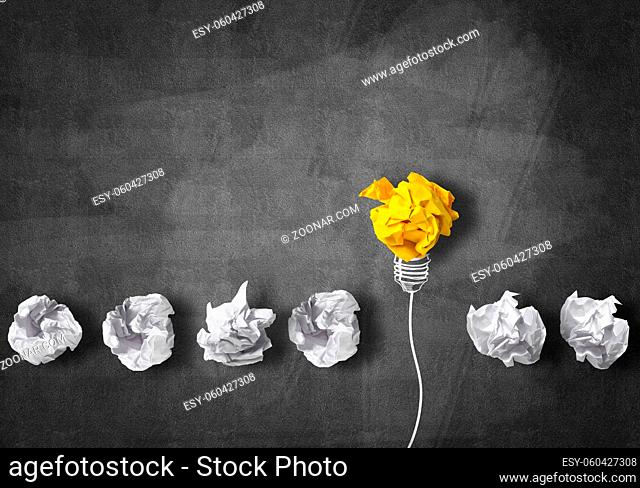 Inspiration concept with crumpled paper light bulb as good idea
