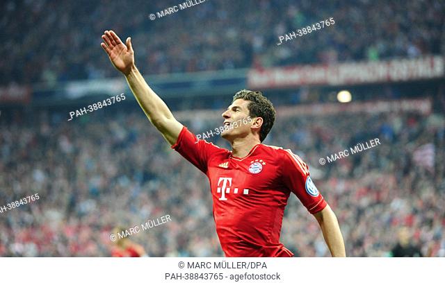 Munich's Mario Gomez celebrates his 5-1 goal during the DFB Cup semi-final match between FC Bayern Munich and VfL Wolfsburg at Allianz Arena in Munich, Germany