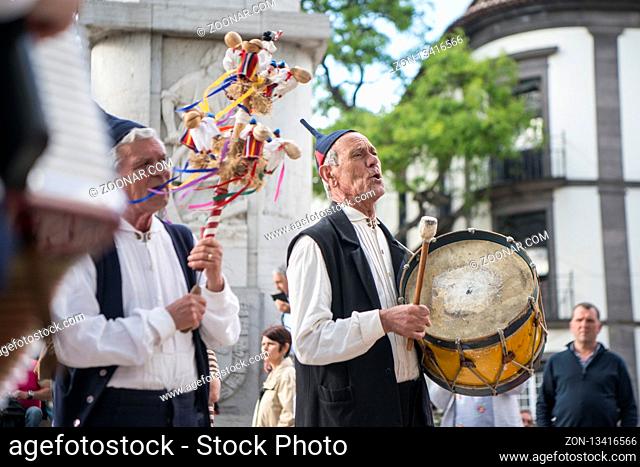 a traditonal madeira folklore music group s at the Festa da Flor or Spring Flower Festival in the city of Funchal on the Island of Madeira in the Atlantic Ocean...