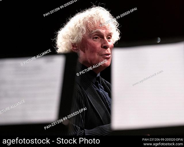 06 December 2023, Bavaria, Munich: Sir Simon Rattle, chief conductor of the Bavarian Radio Symphony Orchestra, will be on stage at the Bavarian Radio's (BR)...