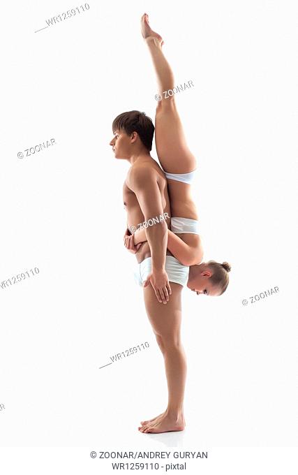 Pair of gymnasts showing acrobatic support