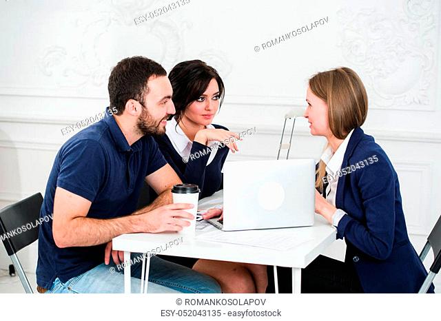 Young couple meeting architect for future house