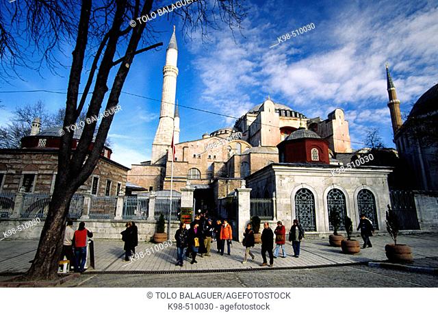 Group of tourists by St. Sophia Mosque (c. 537), Sultanahmet, Istanbul. Turkey