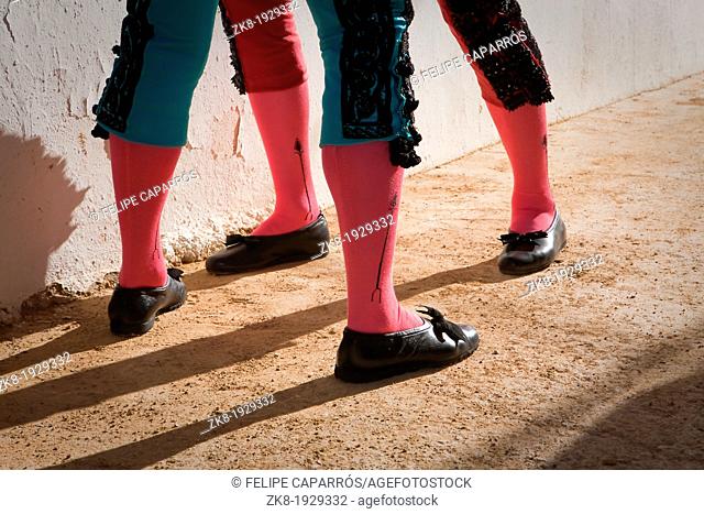 Legs of bullfighters waiting in the patio de cuadrillas, Jaen, Spain