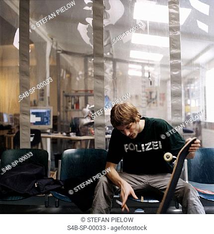 Young Man with Polizei (police) T-Shirt