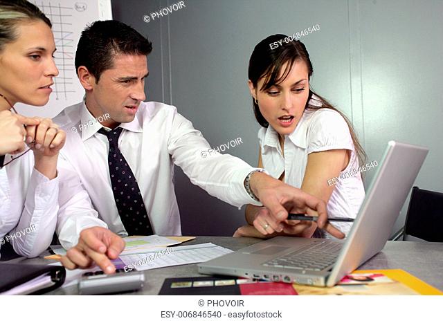 Disgusted businesspeople looking at marketing results