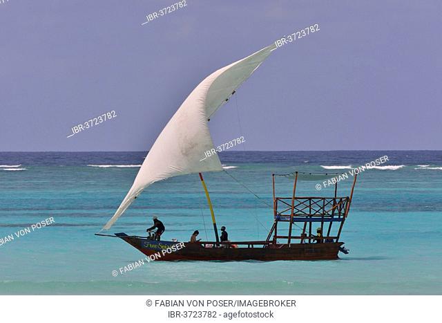 Dhow sailing on turquoise waters, Dongwe, Zanzibar, Tanzania