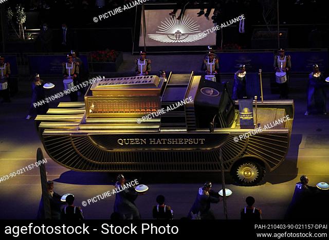 03 April 2021, Egypt, Cairo: A carriage carrying the mummy of ancient Egyptian Queen Hatshepsut rolls out of the Egyptian Museum near Cairo's Tahrir Square...