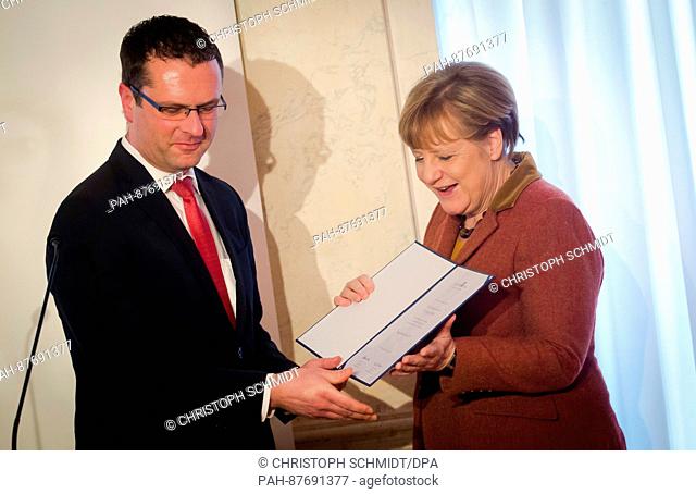 German Chancellor Angela Merkel (CDU) receives the Eugen Bolz Award 2017 from Mayor of Rottenburg am Neckar and chairman of the foundation council